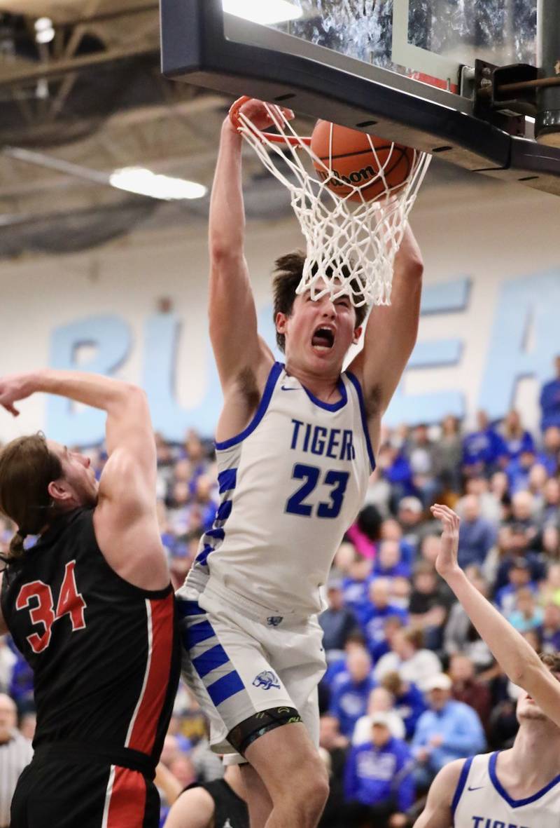 Princeton sophomore Noah LaPorte throws down a dunk in the third quarter of Friday's regional championship game at the Storm Cellar. The Tigers defeated Stillman Valley, 68-37, to repeat as regional champions.