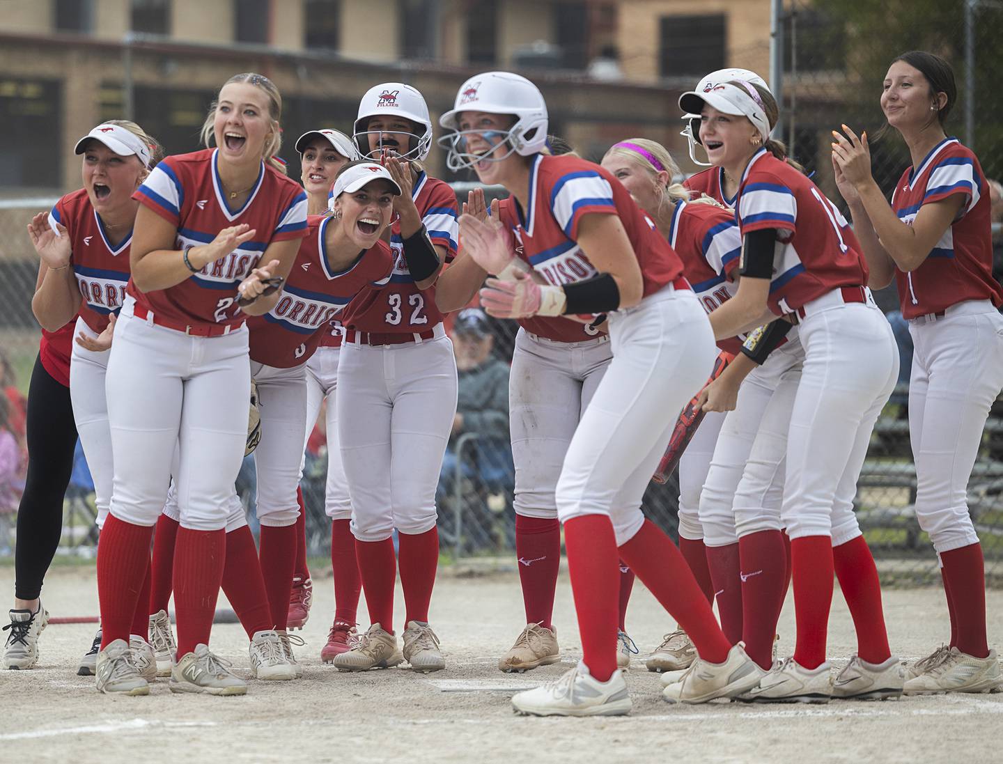 Morrison’s Elle Milnes is congratulated after hitting a two-run homer against Fulton Friday, May 22, 2026, at the Class 1A softball regional at Newman High School.