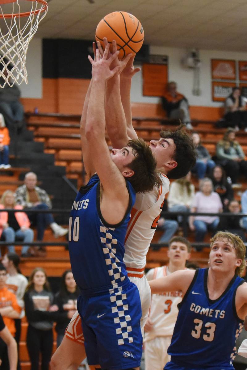 Clifton Central's Blake Chandler, left, and Reed-Custer's Reed Millette battle for a rebound during the River Valley Conference Tournament semifinals at Gardner-South Wilmington Tuesday, Feb. 10, 2026.