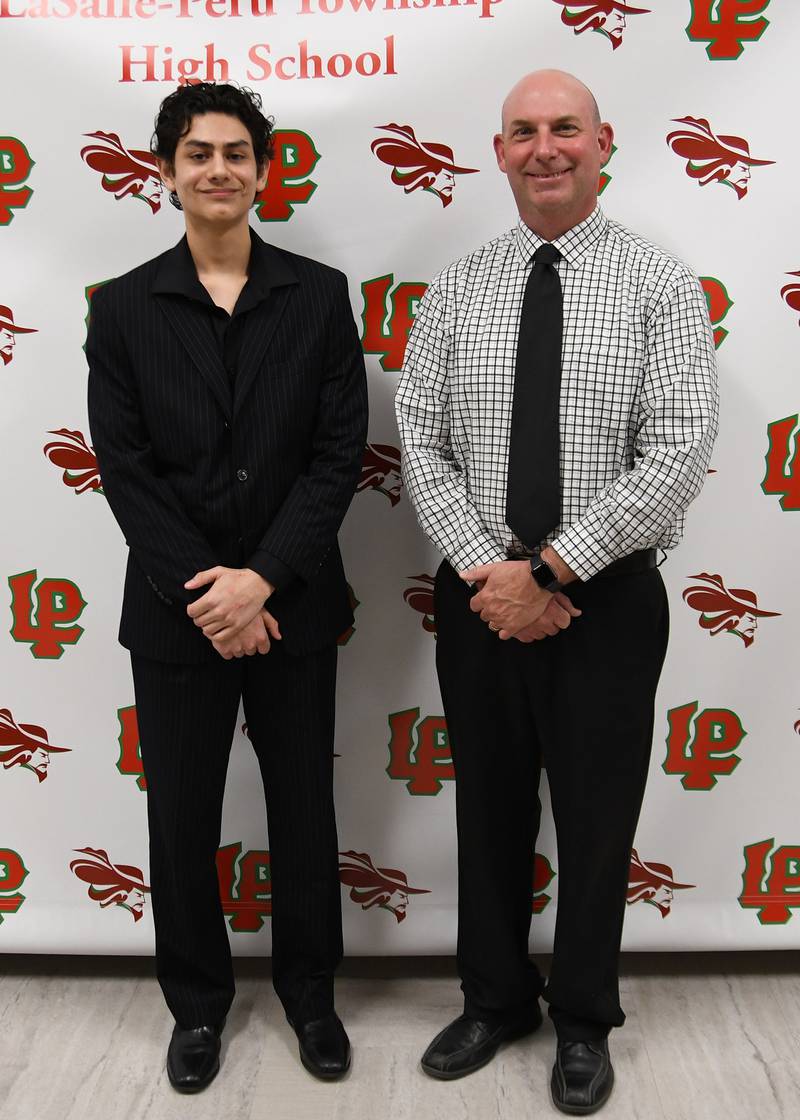 Jonathan Perez  (left) received the 2023 Bertusi Award for Social Science at La Salle-Peru High School.