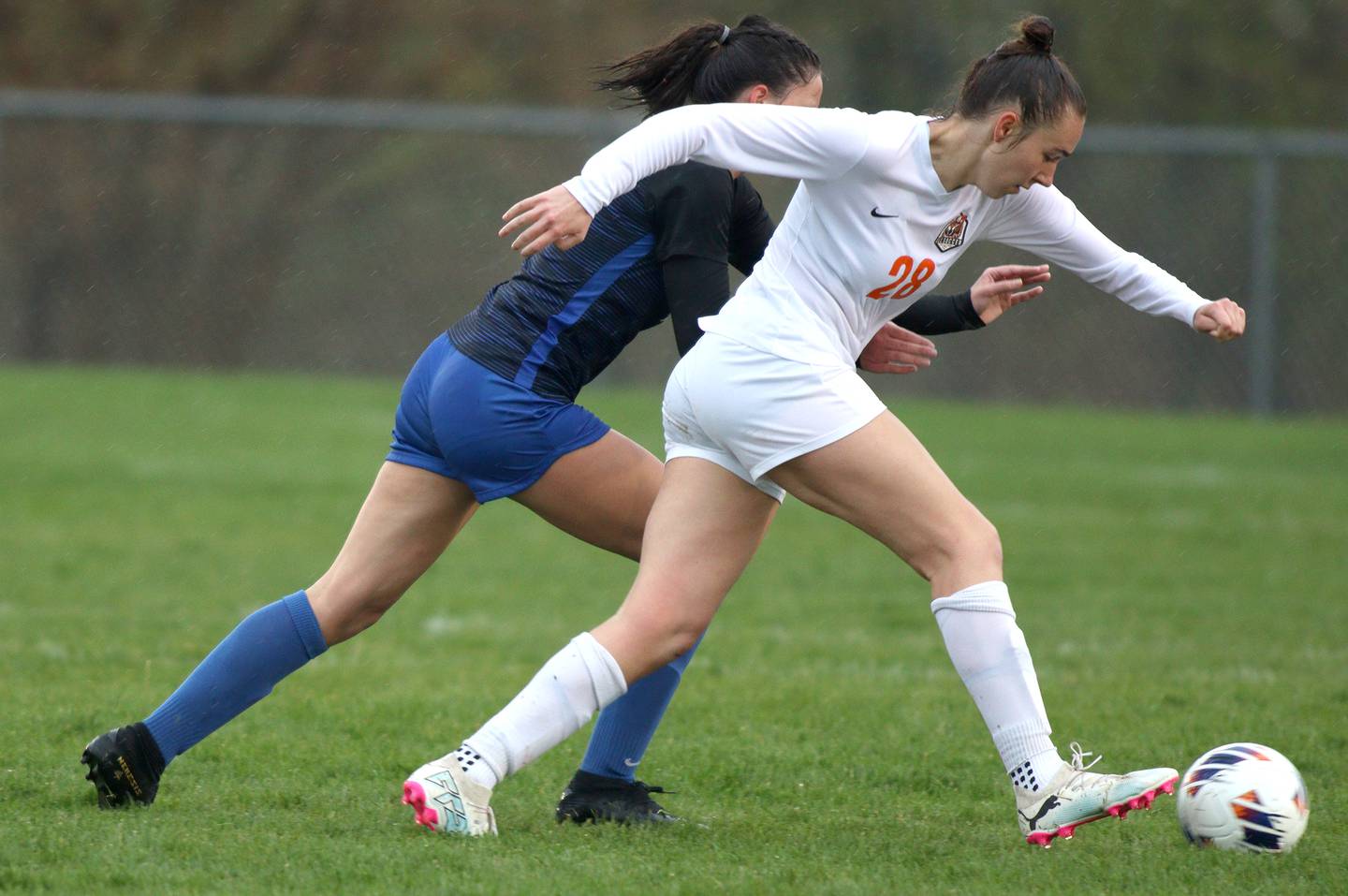 Crystal Lake Central’s  Jillian Mueller moves the ball in varsity soccer at Burlington Thursday night.