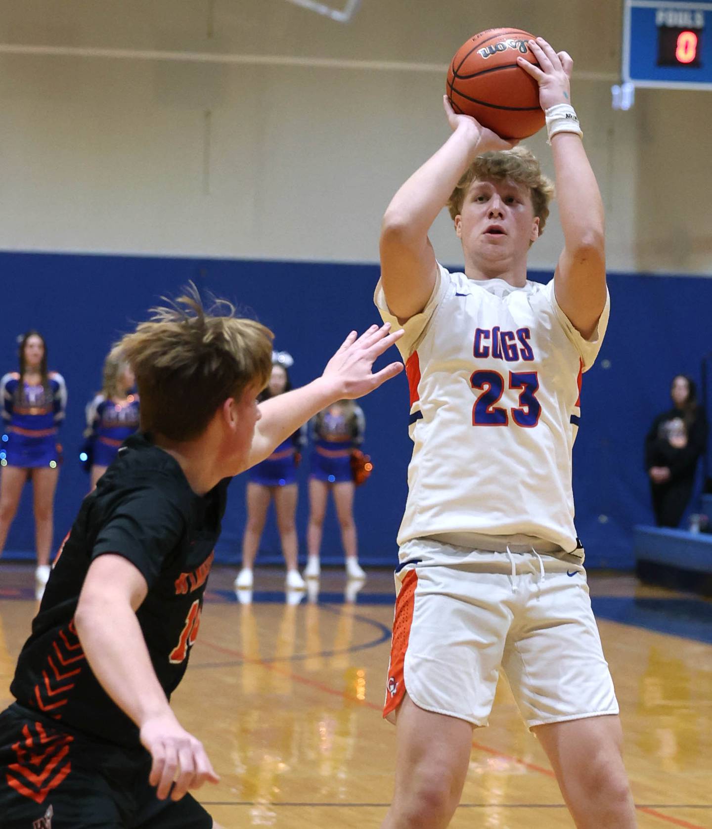 Genoa-Kingston's Hayden Hodgson shoots over a Winnebago defender during their game Tuesday, Jan. 30, 2024, at Genoa-Kingston High School.