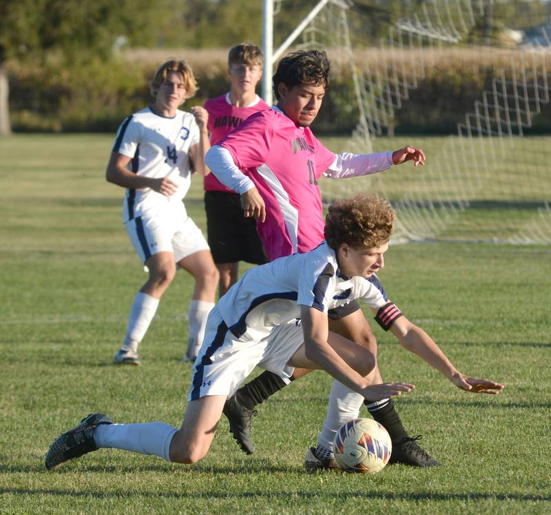 Oregon's Justin Montez-Arroyo and Faith Christian's Carslon Bivins battle for the ball during a Thursday, Oct. 9, 2025 game at Oregon Park West.