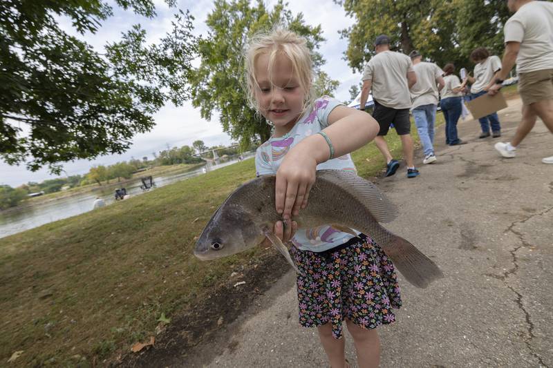 Wrenley Morris, 5, of Dixon displays her fish Saturday, Sept. 20, 2025, in Dixon.