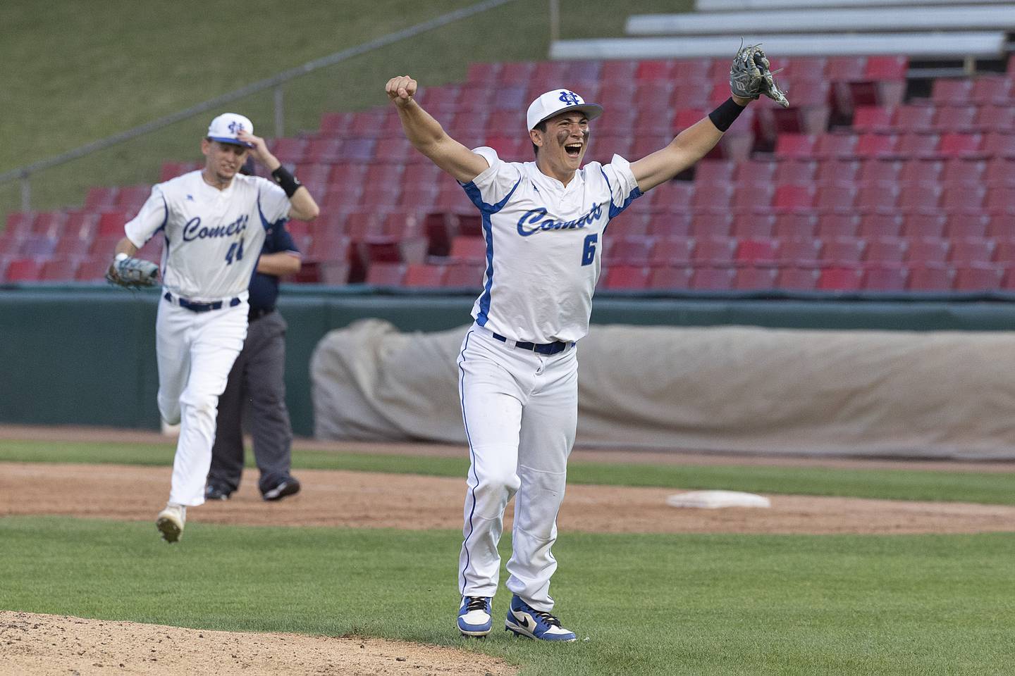 Newman’s Evan Bushman celebrates the Comet’s 5-1 win over Chicago Hope Monday, June 2, 2025, during the Class 2A Supersectional at Northwestern Medicine Field in Geneva.