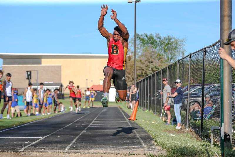 Batavia's Jalen Buckley competes in the triple jump during the DuKane Conference Track and Field meet at Wheaton Warrenville South.  May 13.2022.
