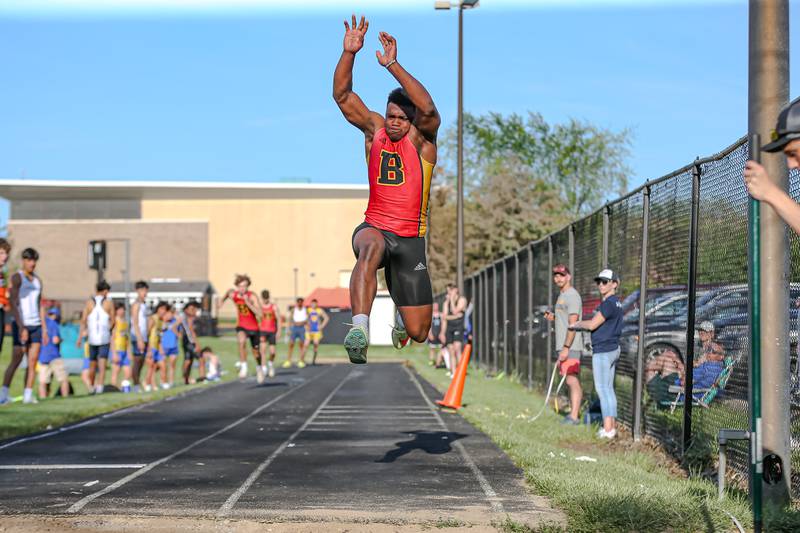 Batavia's Jalen Buckley competes in the triple jump during the DuKane Conference Track and Field meet at Wheaton Warrenville South.  May 13.2022.