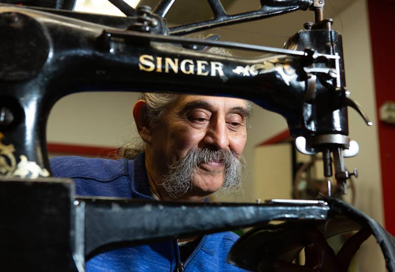 Tino Rubio sews part of a boot. This is a recreation of a Times photo from a 1987 article. Tino’s Shoe and Boot Repair allowed him to make people’s lives better and let him perform a craft that was nearly left behind.
