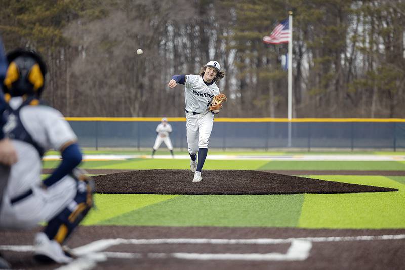 Sterling’s Garrett Polson fires a pitch against Erie-Prophetstown Wednesday, March 15, 2023 on the newly turfed field at Gartner Park.