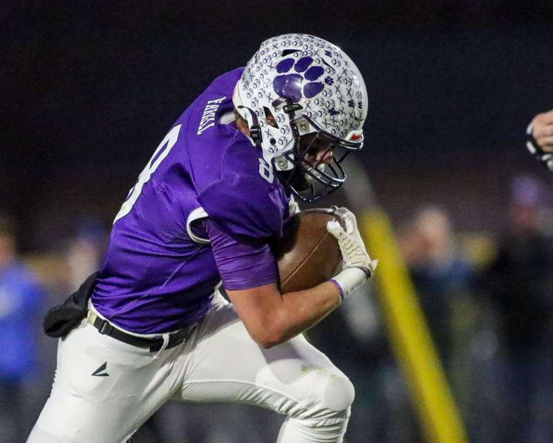 Wilmington's Kyle Farrell (8) runs towards the endzone during Class 2A semi-final playoff football game between Moroa-Forsyth at Wimington.  Nov 18, 2023.