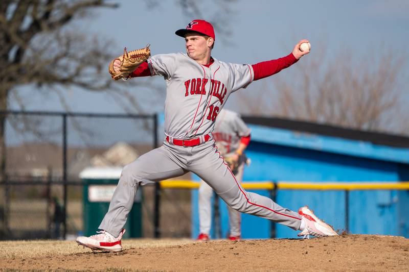 Yorkville's Simon Skroch (16) delivers a pitch against Marmion during a baseball game at Marmion High School in Aurora on Tuesday, Mar 28, 2023.
