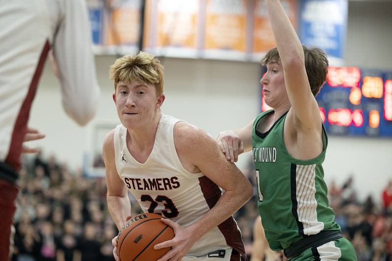 Fulton’s Ethan Price works below the basket against Scales Mound Friday, March 3, 2023 in the 1A sectional final in Lanark.