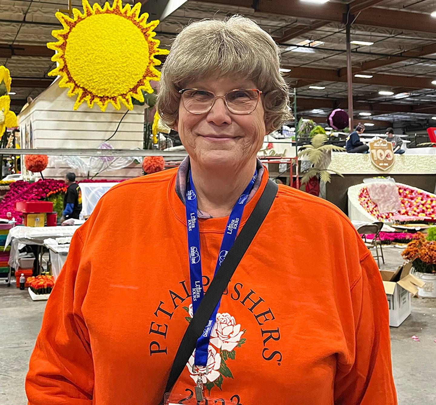 Franklin Grove resident Samantha Dopke helping decorate floats for the 2023 Tournament of Roses Parade