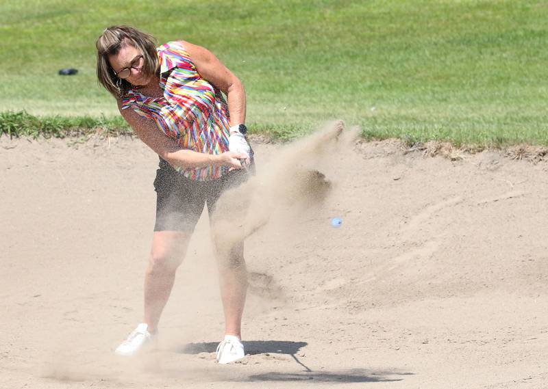 Tammy Johnson gets out of the bunker on the sixth hole during the Illinois Valley Womens Golf Championship on Saturday, Aug. 11, 2024 at Deer Park Golf Club in Oglesby.