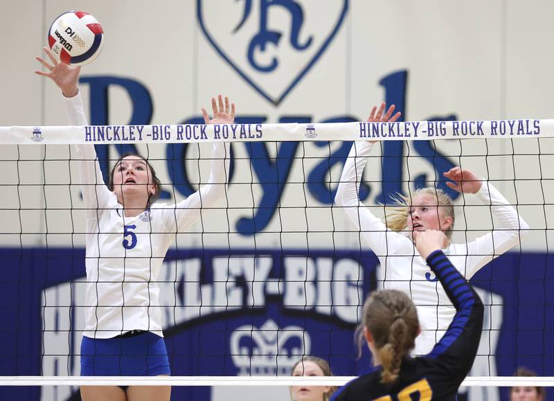 Hinckley-Big Rock's ILY Hunt and Brynn Gawel try to block the spike of Somonauk's Morgan Potter during their match Thursday, Sept. 15, 2022, at Hinckley-Big Rock High School.