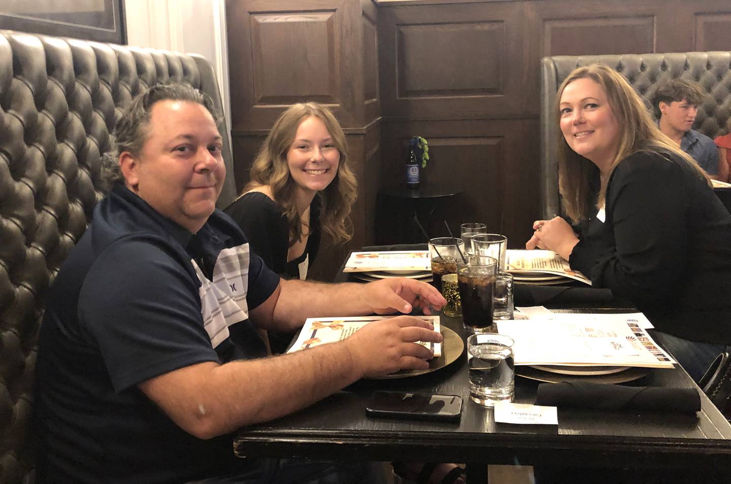 Isabella Caciatorri, of Spring Valley, (middle) with parents Justin and Amy, was one of four recipients of the Carol and Dick Janko Scholarship for Promising Entrepreneurs. The Janko family was represented at the reception by Jason and Amy (Janko) Gahan.