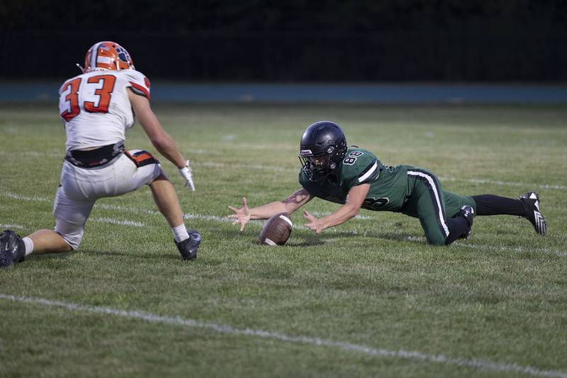 Rock Falls’ Koltyn Stombaugh dives on a bad long snap against Byron Thursday, August 28, 2025.