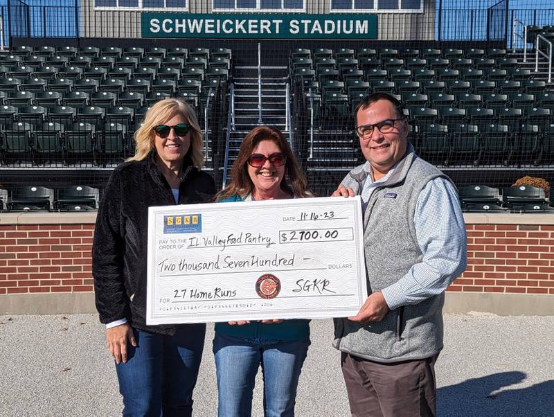 Schweickert Ganassin Krzak Rundio, LLP (SGKR) and the Illinois Valley Pistol Shrimp announced a $2,700 donation to the Illinois Valley Food Pantry in La Salle for the 2023 baseball season. June Keeley, general manager of the Pistol Shrimp,; Mary Jo Credi, executive director of the IV Food Pantry; and Mike Krzak, of SGKR pose with a donation check.