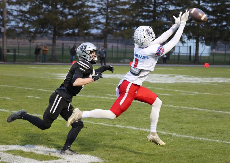 Lakes' Chase Davis can’t quite reach the pass as he got behind the coverage of Kaneland's Brady Alstott Saturday, Nov. 1, 2025, during their first round playoff game at Kaneland High School in Maple Park.