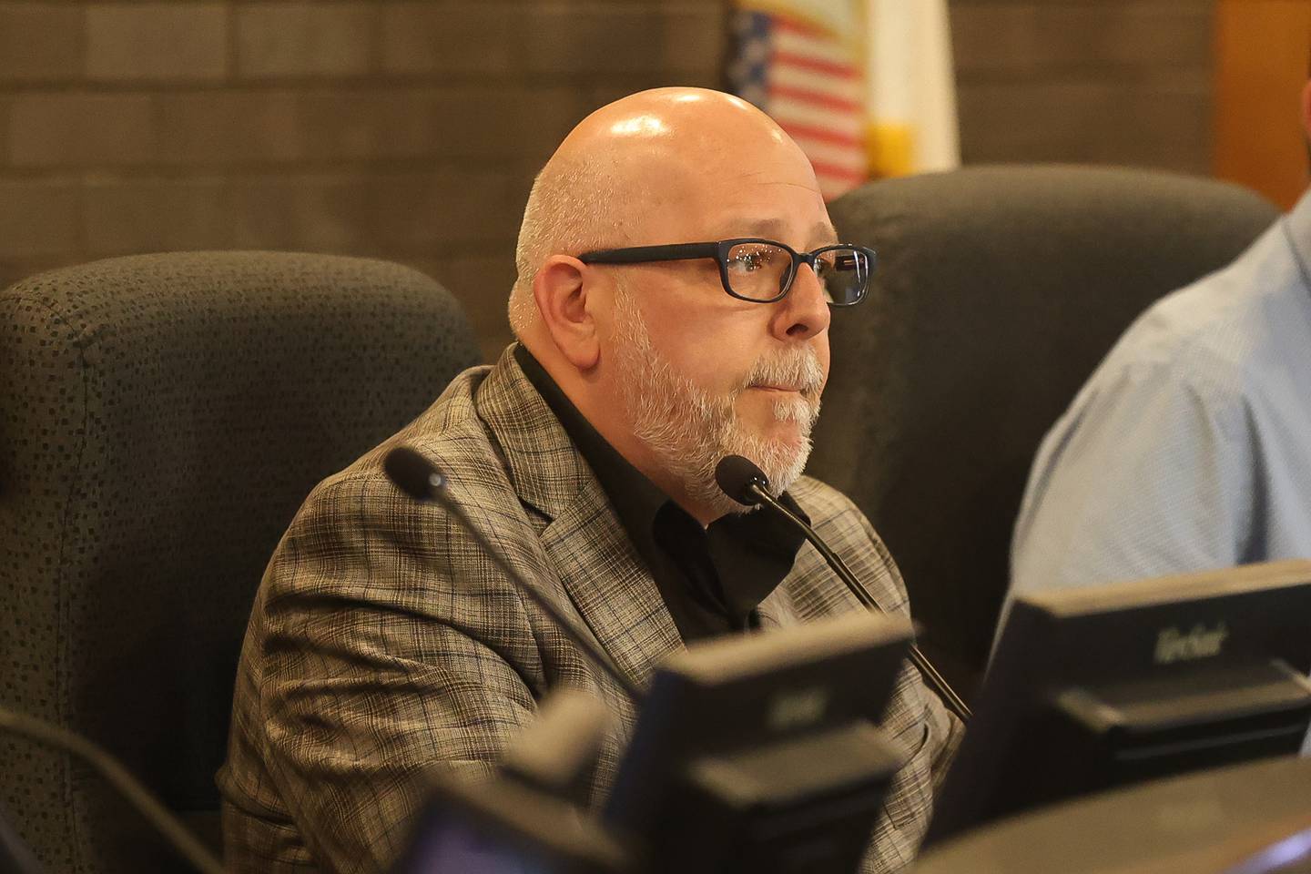 Chairman Quinn Adamowski leads a special hearing by the Joliet Board of Fire and Police Commissions regarding the recommended termination of Joliet Police Lt. Jeremy Harrison on Wednesday, May 13, 2026 at Joliet City Hall.