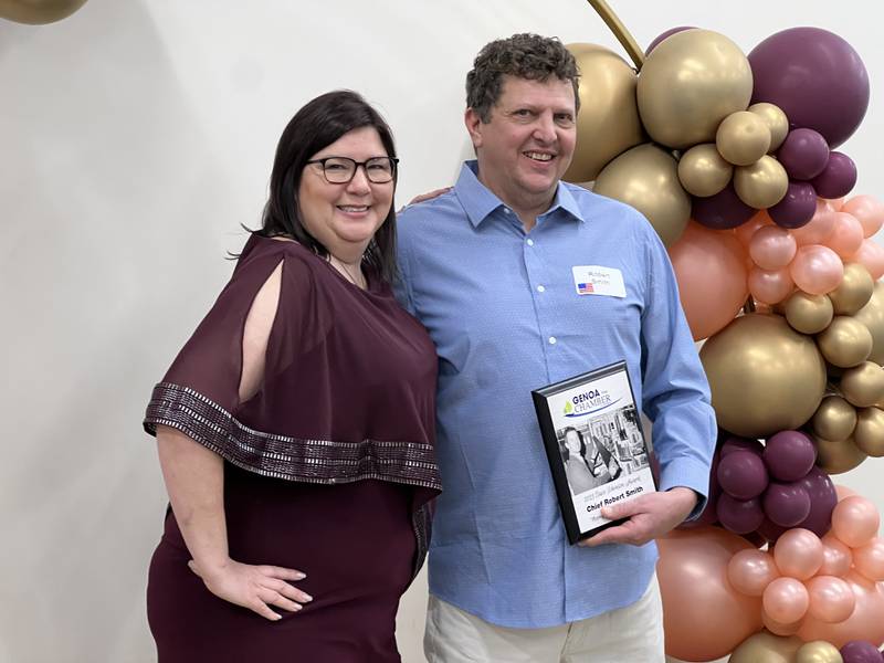 Genoa Area Chamber of Commerce Executive Director Krissy Johnson and Genoa Chief of Police Robert Smith, the 2024 David Tobinson award winner, stand together after the 2024 Genoa Area Chamber of Commerce annual dinner and award banquet on Feb. 21, 2024.