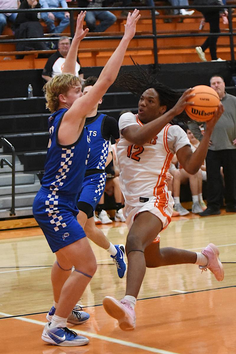 Gardner-South Wilmington's Leondre Kemp, right, looks for a path around Clifton Central's Jake Thompson during the River Valley Christian Conference semifinals at Gardner-South Wilmington Tuesday, Feb. 10, 2026.