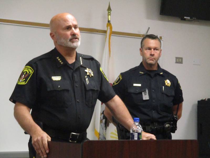 Kendall County Sheriff Dwight Baird, left, outlines plans for housing Kendall inmates at the Kane County jail, as Kane County Sheriff Ron Hain listens, during a press conference on July 27 at Hain's office in St. Charles. (Mark Foster -- mfoster@shawmedia.com)