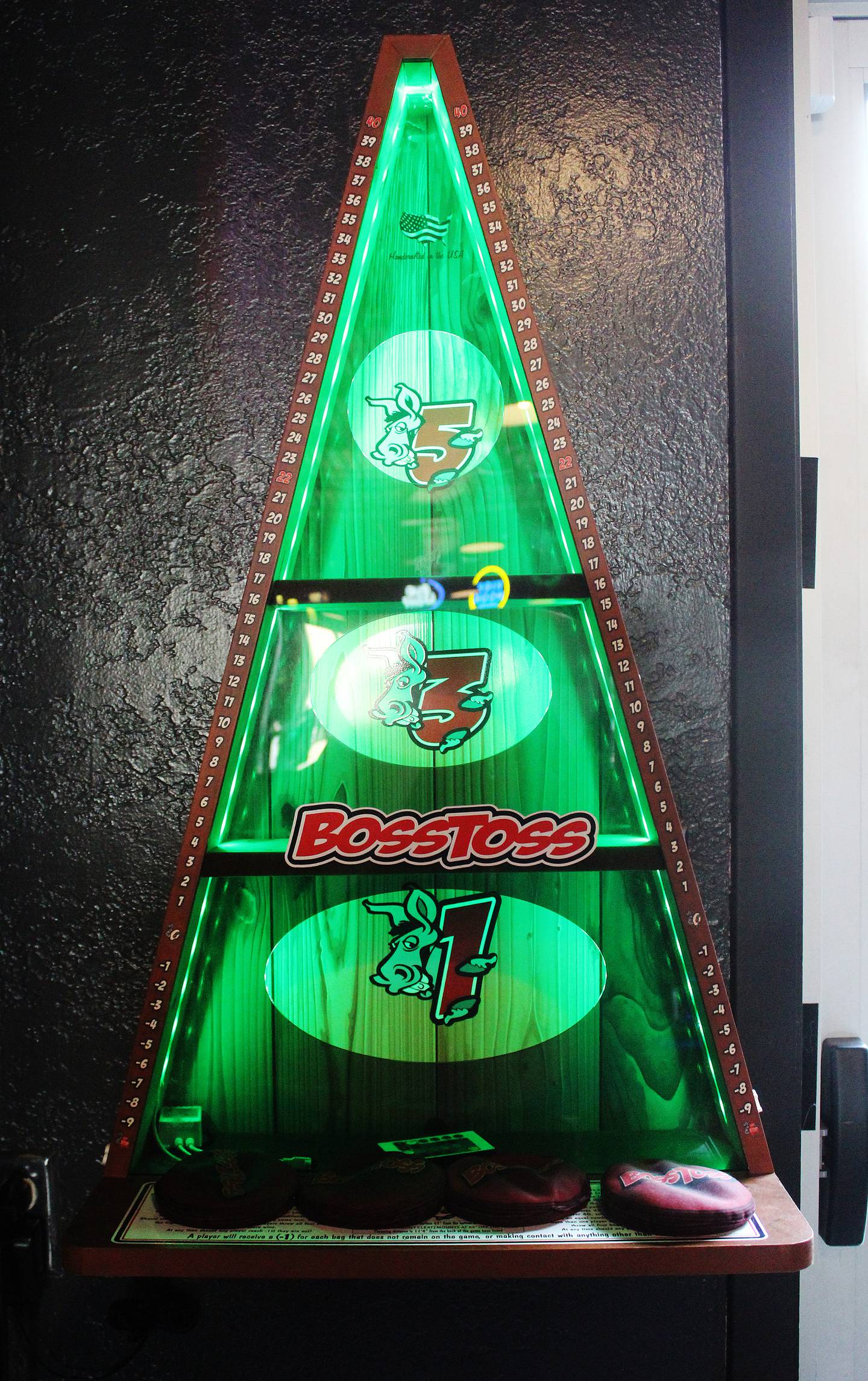 One unique game at Bartini's in Rock Falls that adds to the fun is Boss Toss, which combines styles of bags and skee-ball: The goal is to toss bags inside holes placed on an A-shaped box that hangs vertically on a wall (go to bosstoss.com/how-to-play to learn how to play).