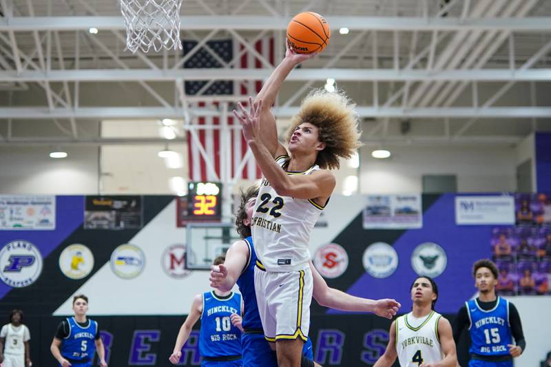 Yorkville Christian's Noah Aguado (22) shoots the ball in the post against Hinckley-Big Rock during a basketball game in the opening round of the 61st annual Plano Christmas Classic at Plano High School on Monday, December 23, 2024.