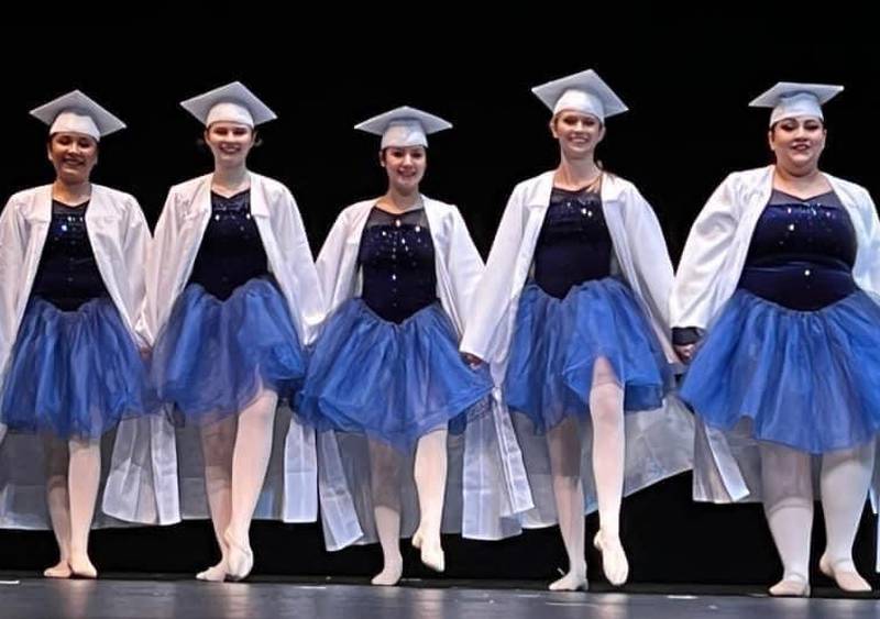 Janelle Gomez, Kaydence Larson, Marisa Salmon, Taylor Brown and Faith Garza perform their ballet dance, “Graduation” at Woodlawn Dance Academy’s 2022 recital, “School of Dance.”