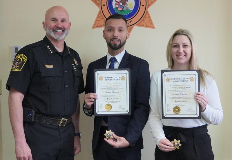 Pictured from left are Sheriff Baird, Deputy Melgoza and Deputy Vojvoda.