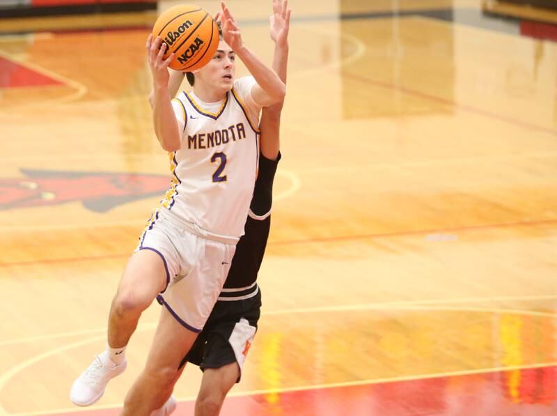 Mendota's Alex Beetz makes his way into the lane against Kewanee during the 50th annual Colmone Classic on Thursday, Dec. 12, 2024 at Hall High School.