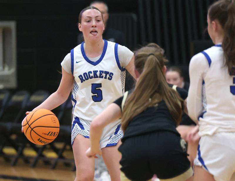 Burlington Central's Audrey Lafleur brings the ball up against Sycamore's Cortni Kruizenga Thursday, Feb. 19, 2026, during their Class 3A regional championship game at Sycamore High School.