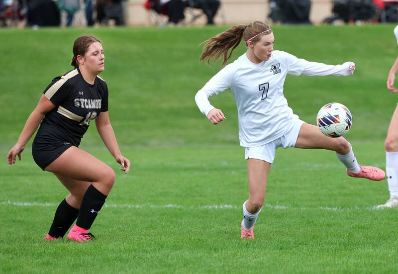 Kaneland's Olivia Davis controls the ball in front of Sycamore's Charlotte Yates during their game Wednesday, April 29, 2026, at Sycamore High School.