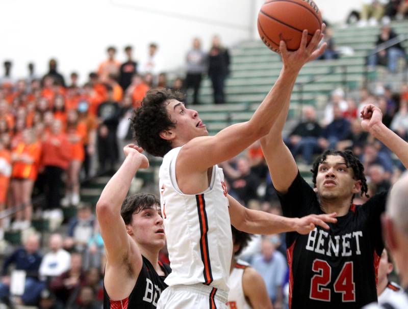 Wheaton Warrenville South’s Rourke Robinson goes up for a shot during a Class 4A Bartlett Sectional semifinal game against Benet on Wednesday, March 2, 2022.