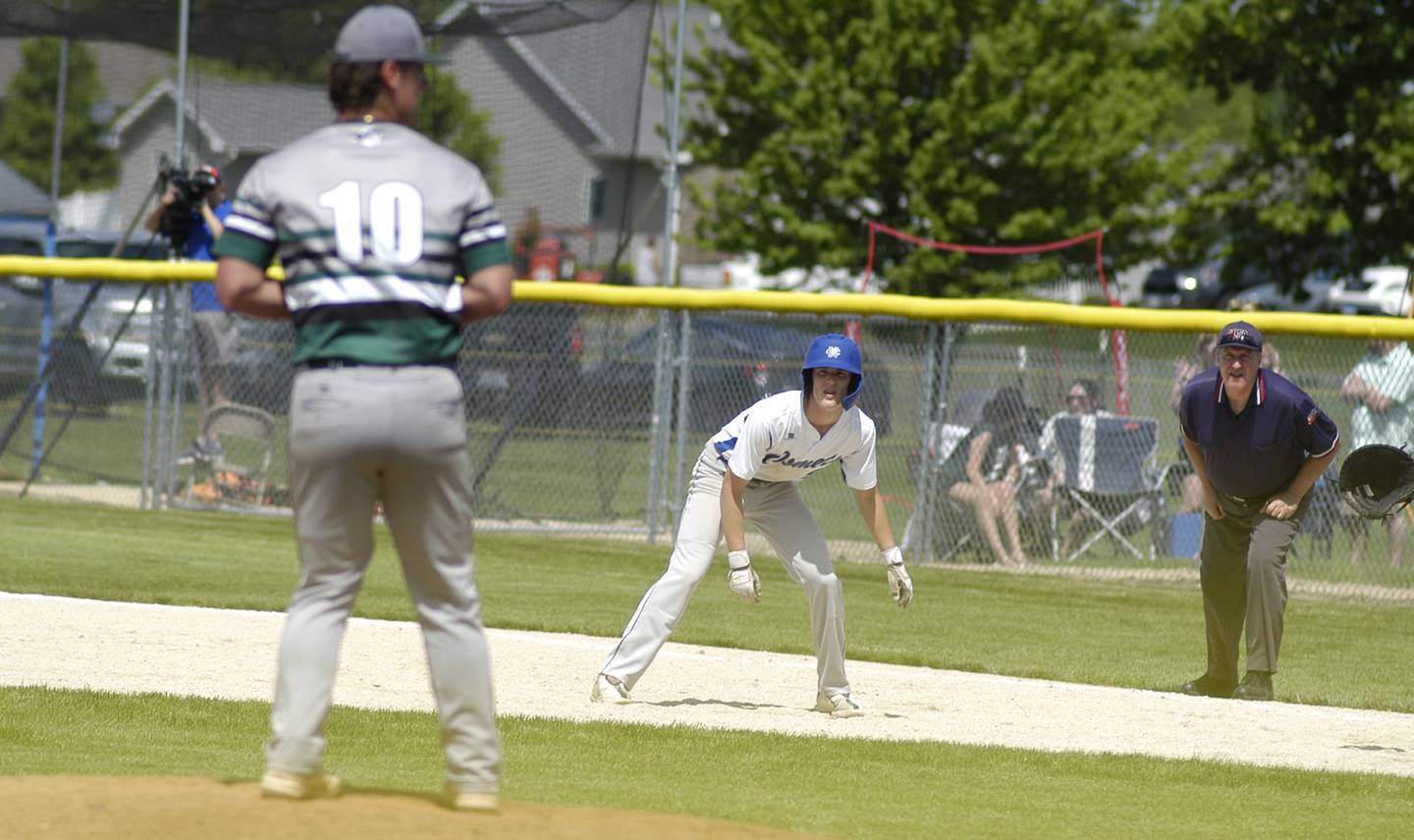 A Newman baserunner leads off first. The action took place in the 2A Regional baseball game at Larry Ybarra field at Newman High School, Saturday, May 18th 2024.