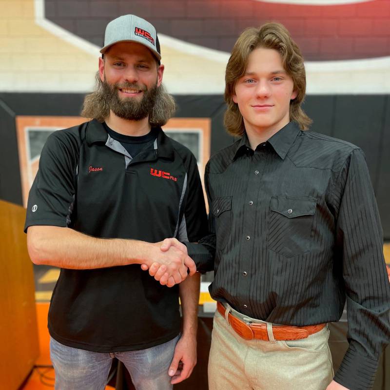 Elijah Somlock of Sandwich High School, right, was awarded the Wehrli Custom Fabrication Scholarship in May 2023.