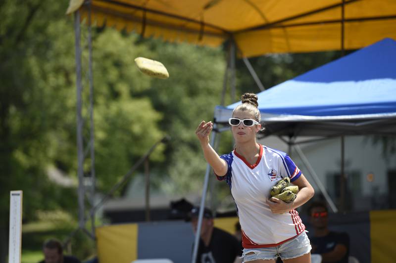 Piper Michl, 16, of Martinton, competes in the cornhole tournament in Momence on Sunday, Aug., 10, 2025.  The tournament was the largest of it's kind for the area with 162 participants.