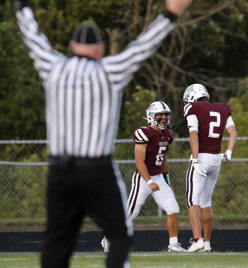 Prairie Ridge's Luke Vanderwiel and his teammate, Logan Thennes, celebrate a Vanderwiel touchdown during a Fox Valley Conference football game on Friday, Sept. 5, 2025, at Prairie Ridge High School in Crystal Lake.
