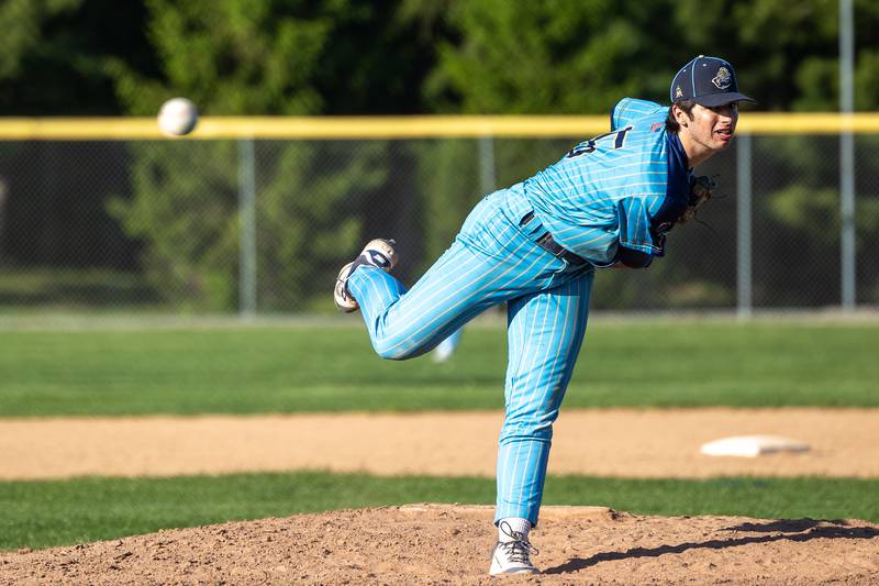 Alec Novotney (15) of Marquette pitches on Thursday, May 8, 2025 at Masinelli Field in Ottawa.