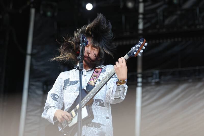 The Linda Lindas vocals and guitarist Lucia de la Garza, 15 years-old, performs on the Roots stage on day three of Riot Fest. Sunday, Sept. 19, 2022, in Chicago.