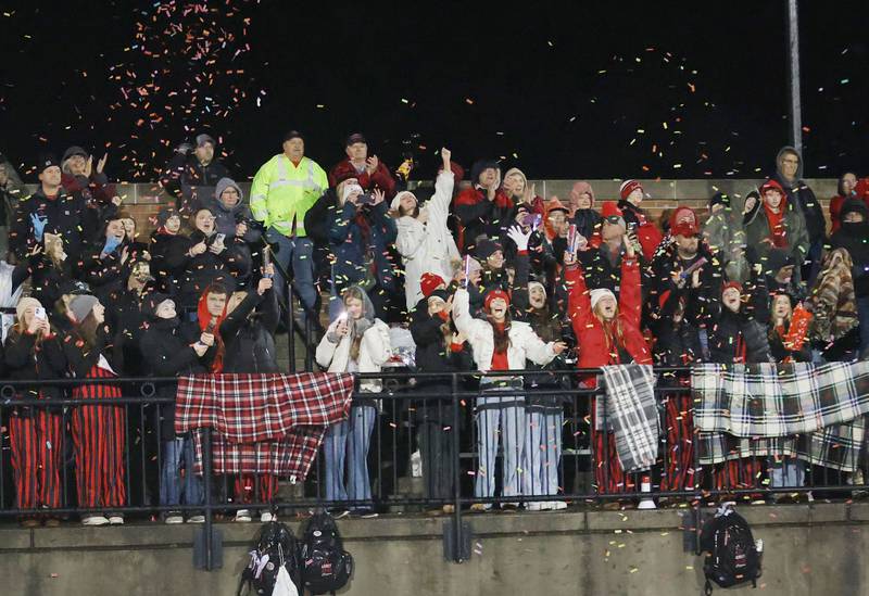 Amboy/LaMoille/Ohio fans throw confetti for the Cliippers as they play Polo during the 8-man I8FA championship game on Friday, Nov. 21, 2025 at April Zorn Memorial Stadium in Monmouth.