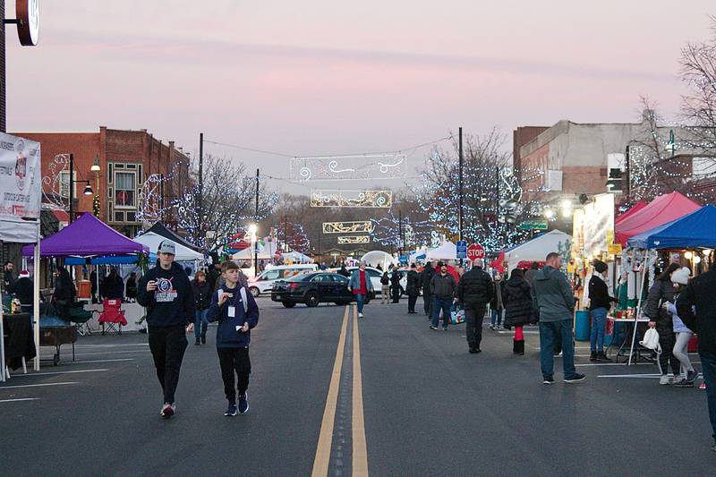 Oswego's Christmas Walk returned to downtown Oswego on Friday, Dec. 3, after taking a year off because of the COVID-19 pandemic.