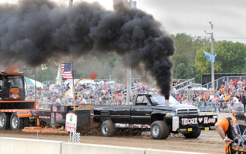 Local favorite Josh Stahl, driving "Thicker 'n' Blood" competes in the Sandwich Fair tractor pull on Thursday, Sept. 5, 2024, at the fairgrounds in Sandwich.