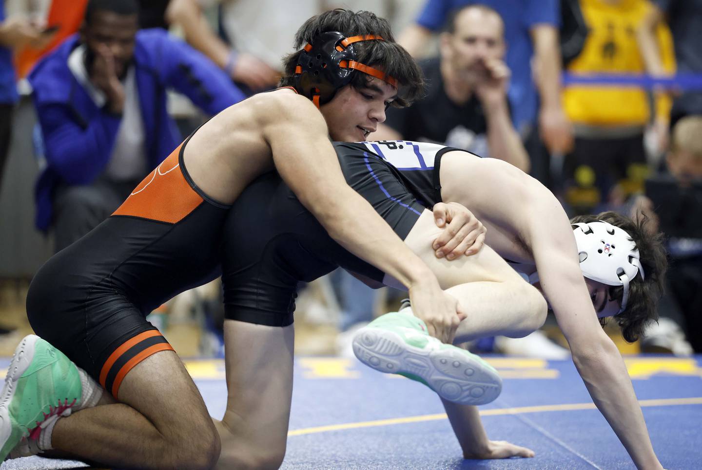 Matthew Lisowski of Wheaton Warrenville South wrestles Asher Graham of St. Charles North at 126-pounds during the DuKane Conference boys wrestling tournament Saturday, Jan. 24, 2026 at Wheaton North High School in Wheaton.