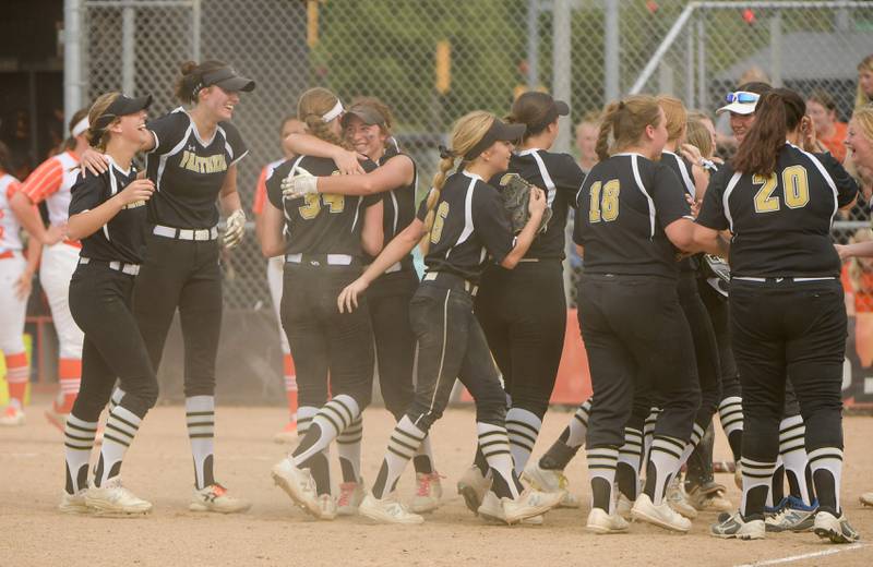 Glenbard North celebrate their 5-4 win over St. Charles East during the Class 4A St. Charles East Sectional semifinal on Tuesday, May 31, 2022.