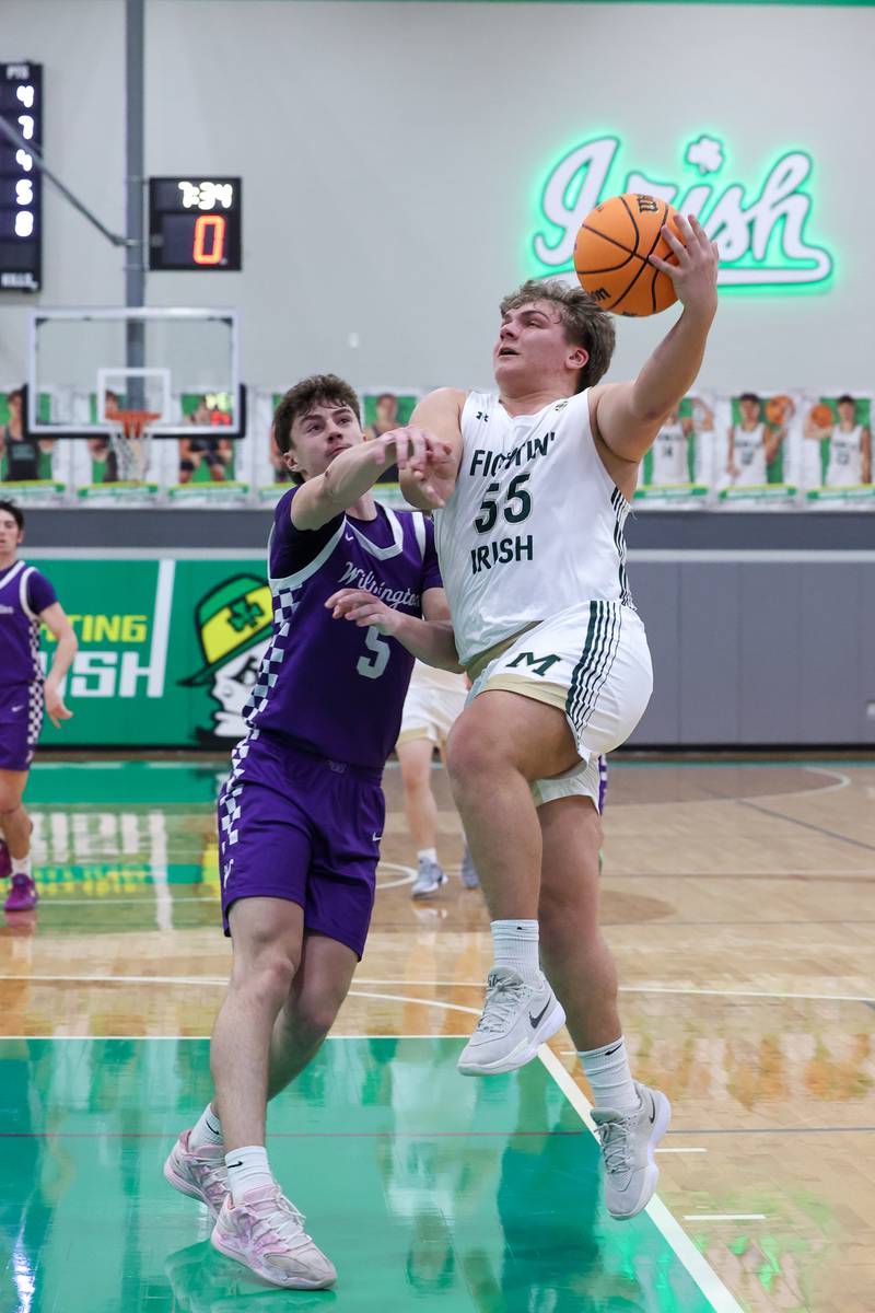 Bishop McNamara's Ian Irps goes for a layup against Wilmington's Declan Moran during Bishop McNamara's 61-24 victory over Wilmington in the IHSA Class 2A Seneca Sectional semifinal on Tuesday, March 3, 2026.