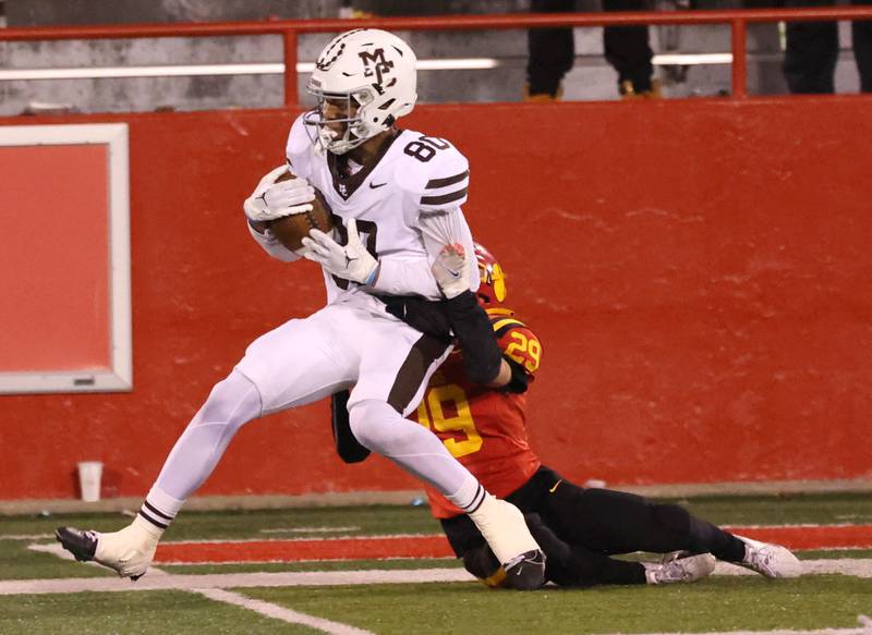Mt. Carmel's Marshaun Thornton is brought down by Batavia's Matthew Hansen during their Class 8A state championship game Saturday, Nov. 30, 2024, in Hancock Stadium at Illinois State University in Normal.