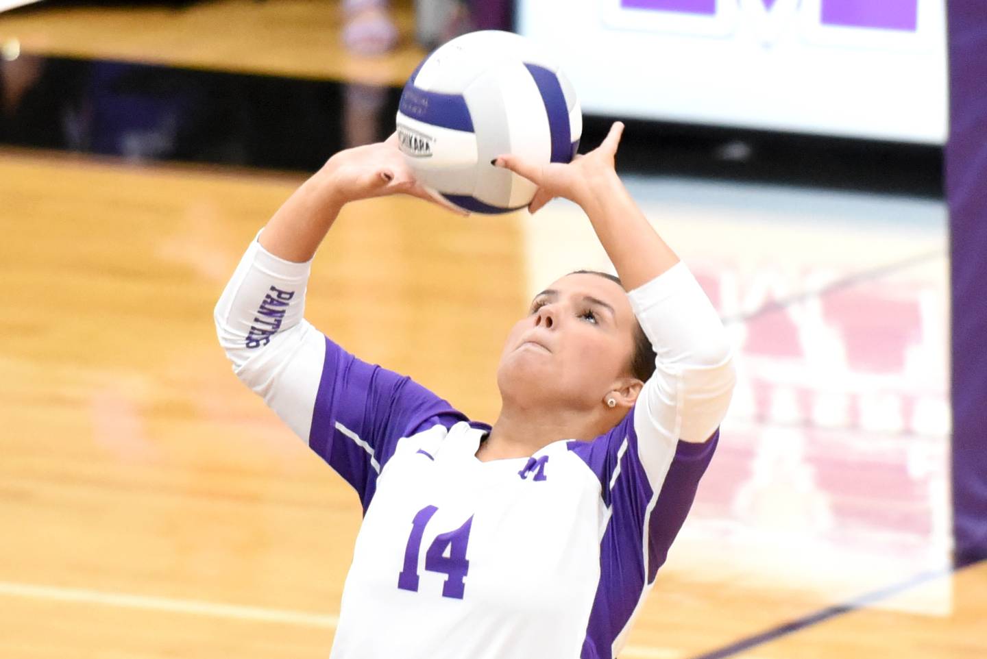 Manteno's Danika Fletcher sets the ball during a home game against Wilmington Tuesday, Oct. 7, 2025.