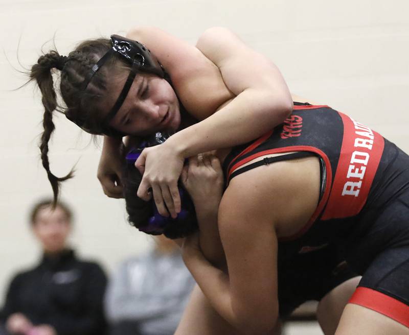 Morris’ Nicolette Boleman tries to take down Huntley’s Lilliana Castanon in the 155-pound match of a nononference wrestling meet on Wednesday, Jan. 22, 2025, at Huntley High School.